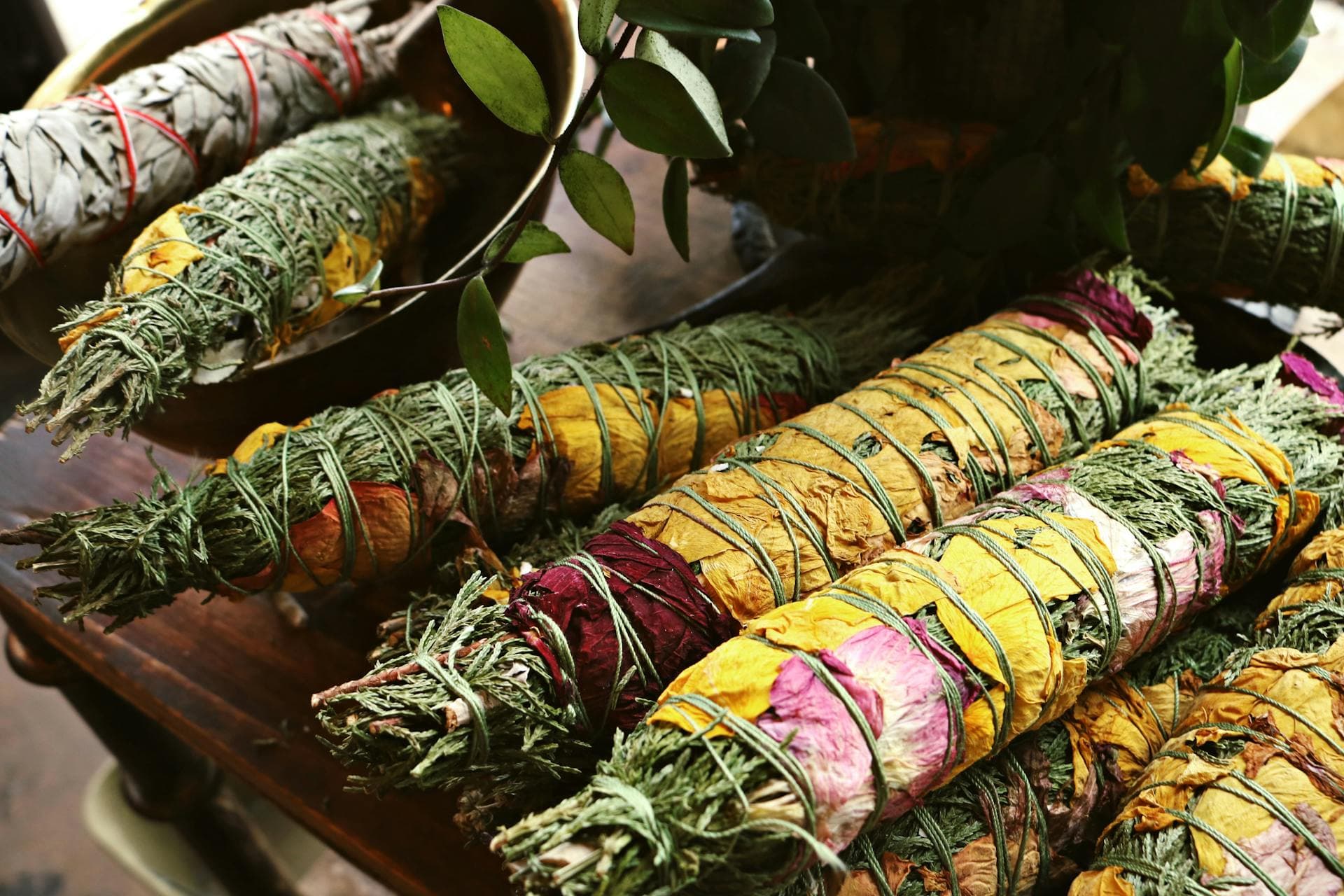 Bundles of dried herbs tied with twine